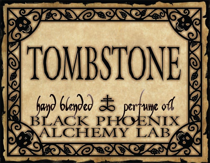 Tombstone perfume label with decorative border and text