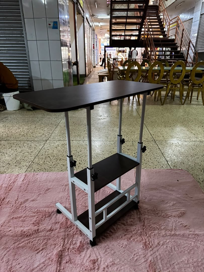 Adjustable dark laptop desk with wheels - original photo