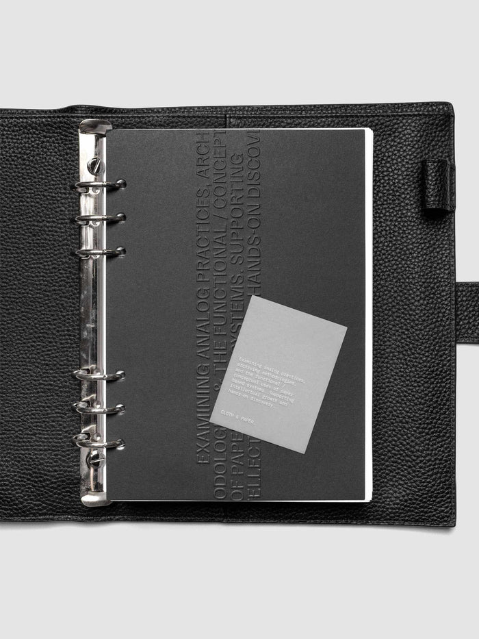 Black embossed Analog Embossed Planner Dashboard with drop card shown in size A5 6-Ring Punch.