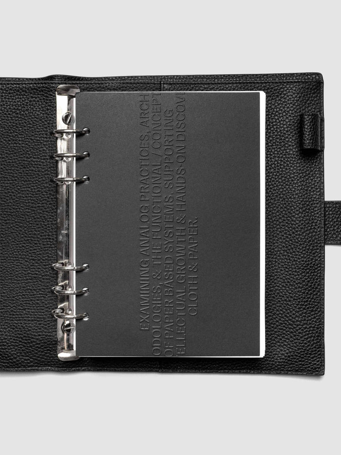 Black embossed Analog Embossed Planner Dashboard without drop card shown in size A5 6-Ring Punch.