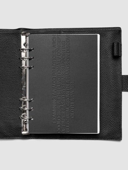 Black embossed Analog Embossed Planner Dashboard without drop card shown in size A5 6-Ring Punch.