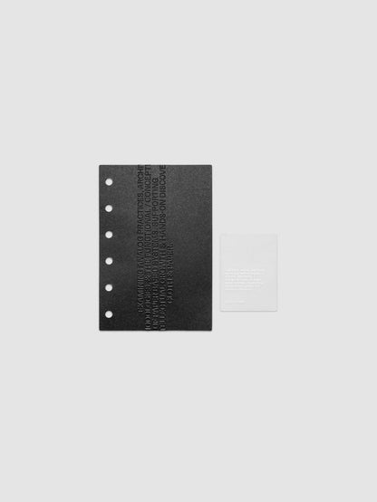 Black embossed Analog Embossed Planner Dashboard with drop card shown in size Pocket.