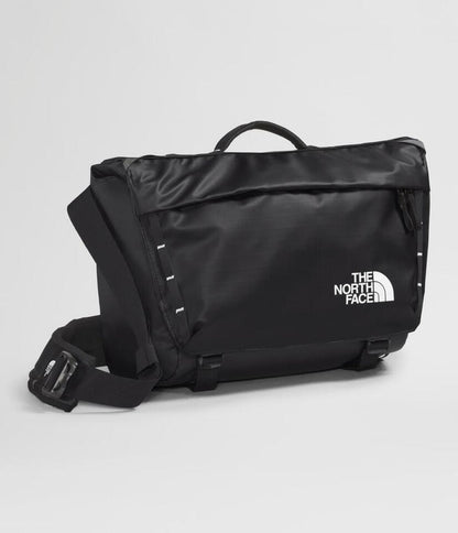 Black The North Face bag on a light gray background