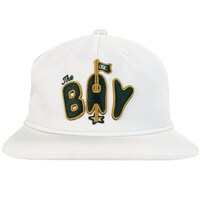 The Bay Area 5 Panel by DOC from Oaklandish is a white unstructured strap back hat with green and gold “The Bay” embroidery, featuring a gold bat-shaped "A," green flag, and gold star. Part of The Bay Collection.