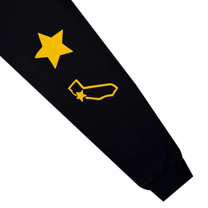The Bay Bridge Hoodie By DOC V2 from Oaklandish features a bold yellow star atop a California outline on black sleeves, with an extra star near the wrist. Crisp white background makes it perfect to pair with your favorite pullover or men's fleece hoodie.