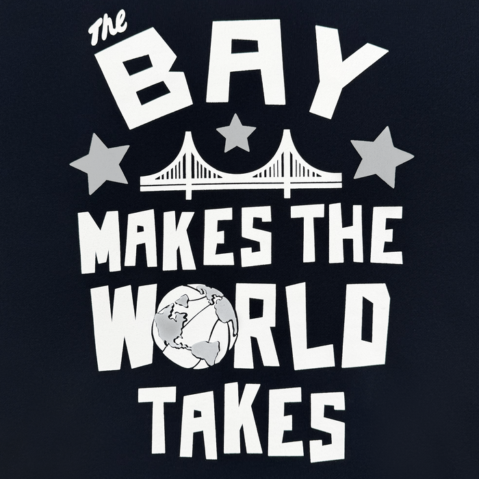 White, bold text reads, “The Bay Makes The World Takes,” accented by a bridge graphic and two stars above a globe illustration. Set against a dark background, the design channels the playful and energetic spirit of the Bay Area. The Bay Bridge Hoodie by DOC from Other is perfect for your collection of Outerwear and showcases local pride.