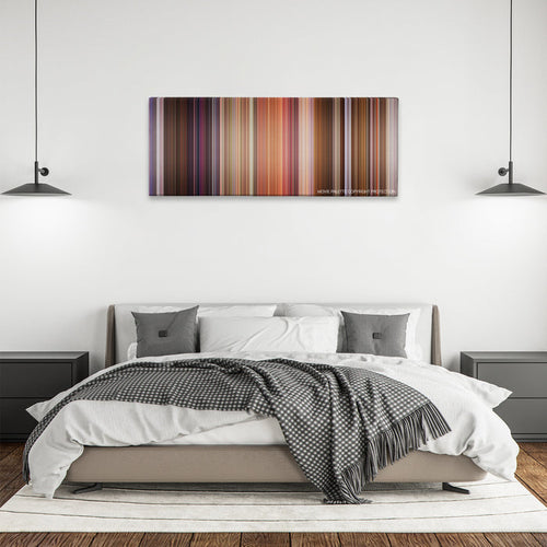 Bedazzled color palette canvas above a bed, between two black pendant lamps