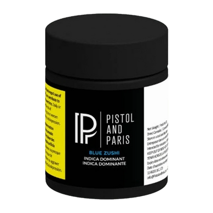 Front three-quarter view of the black jar labeled Pistol and Paris Blue Zushi with a centered white logo and yellow side warning panel.