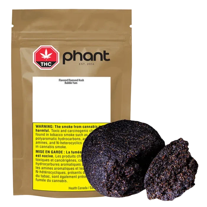 Three-quarter view of a brown resealable pouch behind two dark, crumbly Bubble Yum Hash pieces, showing the pouch's THC logo and warning label.