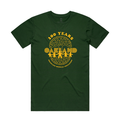 Introducing the Oaklandish Century of Caring Tee: a dark green shirt featuring a bold yellow print that reads "100 YEARS GRADUATE MEDICAL EDUCATION" above trees and a city skyline, with "OAKLAND" prominently displayed in block letters in front of the trees. This special edition tee celebrates UCSF Benioff Children’s Hospital Oakland’s century-long commitment to Graduate Medical Education.