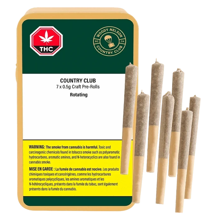 Front-facing pack and seven upright pre-rolls beside it, showing the Country Club PR 7 x 0.5 g label and green, white, and yellow warning panel.
