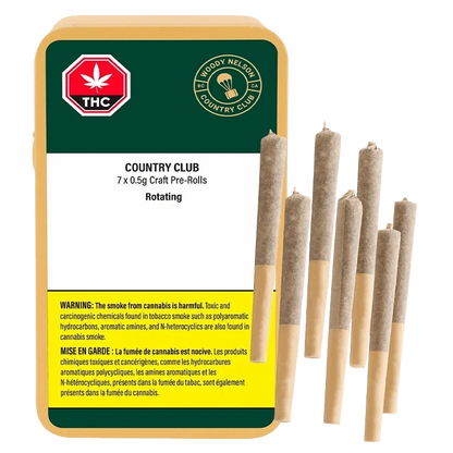 Front-facing pack and seven upright pre-rolls beside it, showing the Country Club PR 7 x 0.5 g label and green, white, and yellow warning panel.
