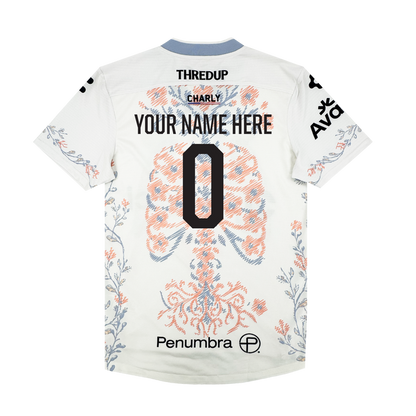 A white Oakland Soul Custom 2026 SC Form Jersey, seen from the back, has blue and orange lung graphics, black sponsor logos, "YOUR NAME HERE" and a bold number 0. The light blue collar and sleeves feature delicate branch accents.
