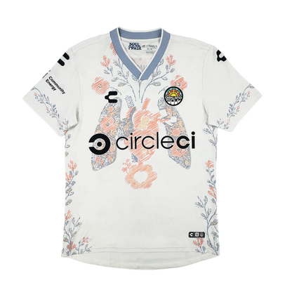 The Custom 2026 OAKLAND SOUL SC FORM JERSEY by Oakland Soul is a white short-sleeve top with orange and blue floral and koi fish graphics, circleci sponsor logos, pale blue collar/sleeves, and black logo patches on shoulders and chest.