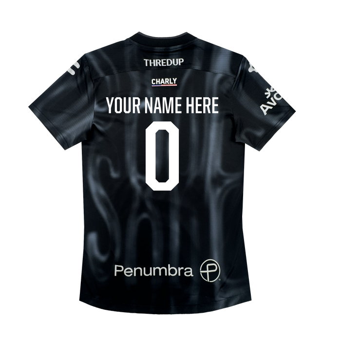 The Custom 2026 OAKLAND SOUL SC SPIRIT JERSEY by Oakland Soul features a black design with “YOUR NAME HERE” in bold white text above a large number 0 on the back, plus sponsor logos on the shoulders and lower back.