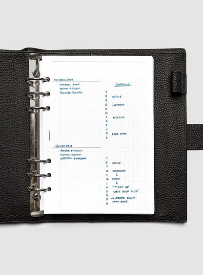 Daily Workflow Planner Inserts, A5 6-Ring Punch, right page with handwritten notes filling the large graph section shown inside a planner