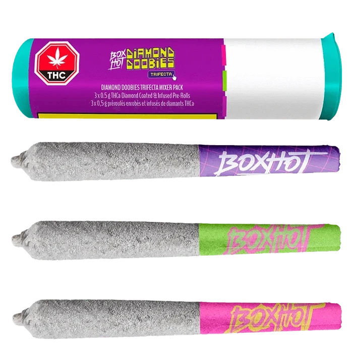 Tube and three gray, diamond-coated joints laid horizontally, shown with the Diamond Doobies Trifecta Mixer Pack Infused PR 3 x 0.5 g branding.