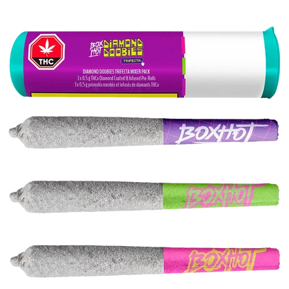 Tube and three gray, diamond-coated joints laid horizontally, shown with the Diamond Doobies Trifecta Mixer Pack Infused PR 3 x 0.5 g branding.