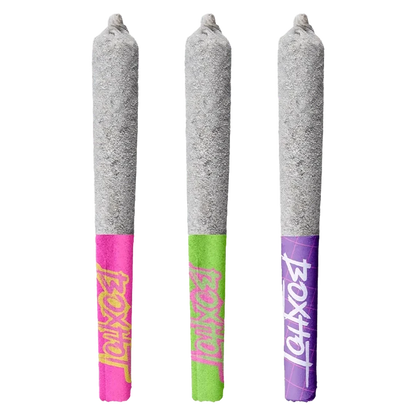 Three upright Diamond Doobies Trifecta Mixer Pack Infused PR 3 x 0.5 g pre-rolls with colorful pink, green, and purple branded tips against a white background.