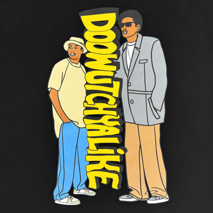 Two illustrated men stand confidently on a black background beside bold yellow text that reads “DOOWUTCHYALIKE.” One sports a yellow shirt, white hat, blue pants, and sneakers; the other wears sunglasses, a gray suit jacket, and tan pants. This Doowutchyalike Tee by Other pays homage to 90s hip hop style—perfect for fans of Oaklandish clothing or Digital Underground.