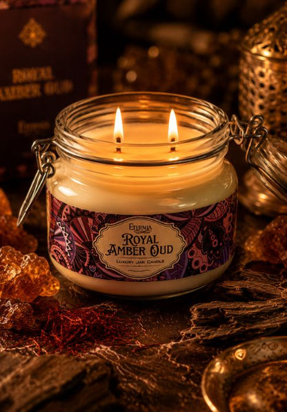Royal Amber Oud double-wick jar candle with two flames in amber glass, metal clasp lid