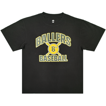 The Fireball Tee by Oakland Ballers is a black classic fit t-shirt crafted from 100% heavy-weight cotton, featuring yellow and white “BALLERS BASEBALL” text and a graphic of two crossed bats with a yellow baseball marked by a black “B” and “7′s” at the center, shown against a plain white background.