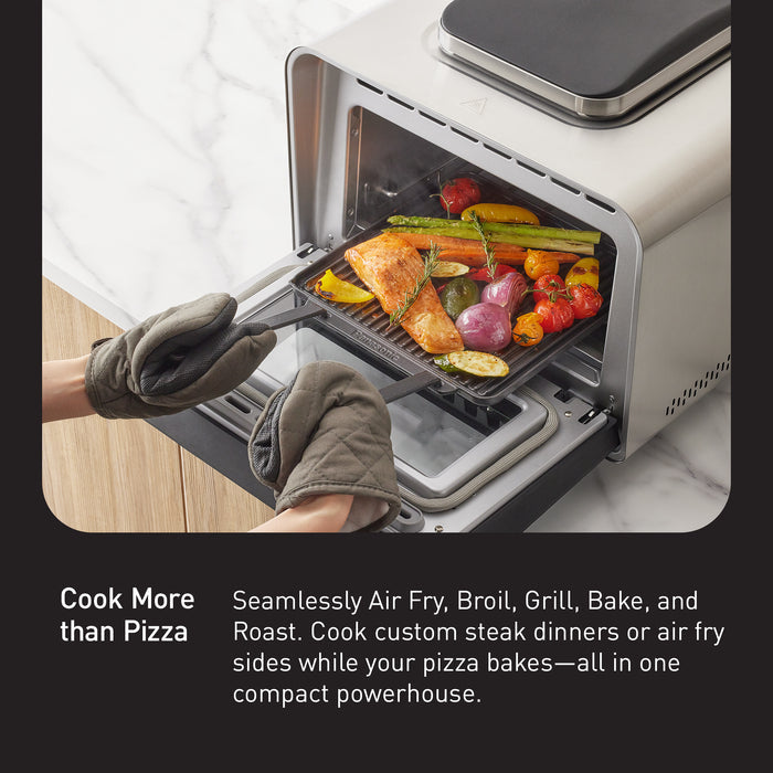 Cook More
than Pizza
Seamlessly Air Fry, Broil, Grill, Bake, and
Roast. Cook custom steak dinners or air fry
sides while your pizza bakes—all in one
compact powerhouse.