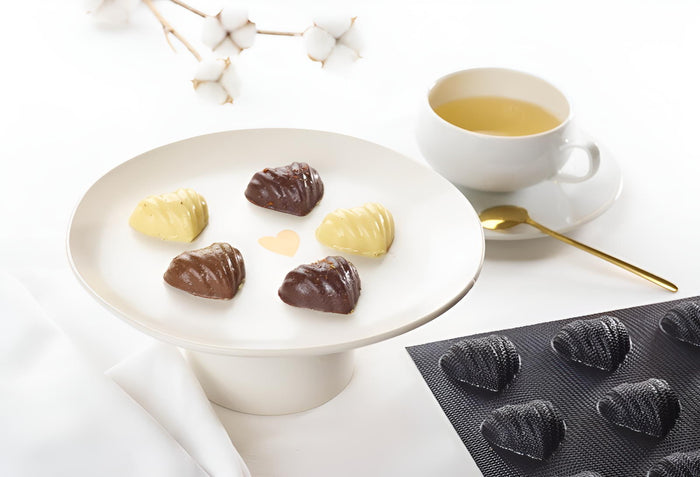 Flexipan - Fluted  Hearts Silicone Mold - 60 forms .49 oz on white background.