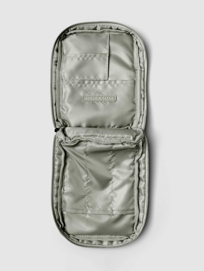 Open view of the empty Fountain Pen Travel Case | Ristretto, showing multiple stitched compartments for pens and accessories.