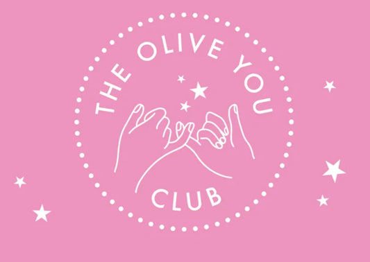 Pink circular logo for Give the OYC Membership featuring two hands linking pinkies surrounded by stars
