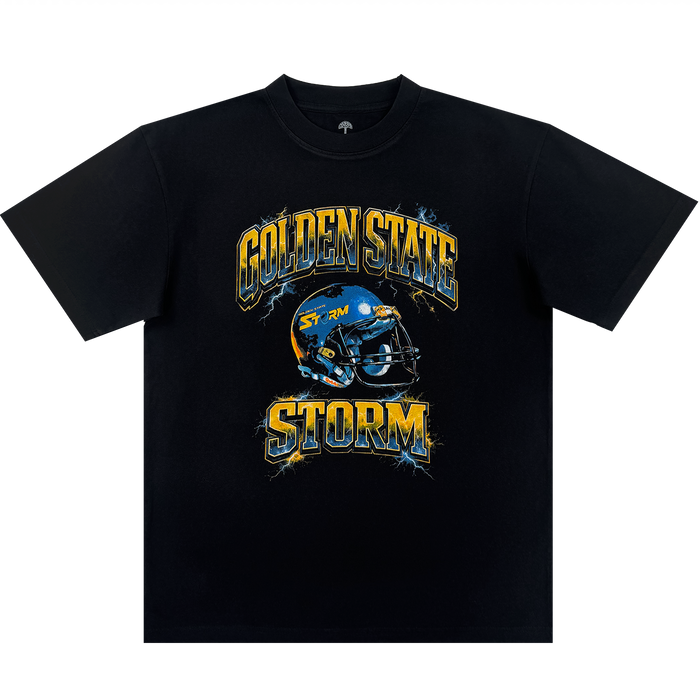 The Golden State Storm Y&B Tee by Oaklandish is a men's black heavy-weight cotton t-shirt with a blue football helmet, “STORM”, yellow-and-blue “GOLDEN STATE STORM” text, and a bold lightning-effect background in a classic fit.