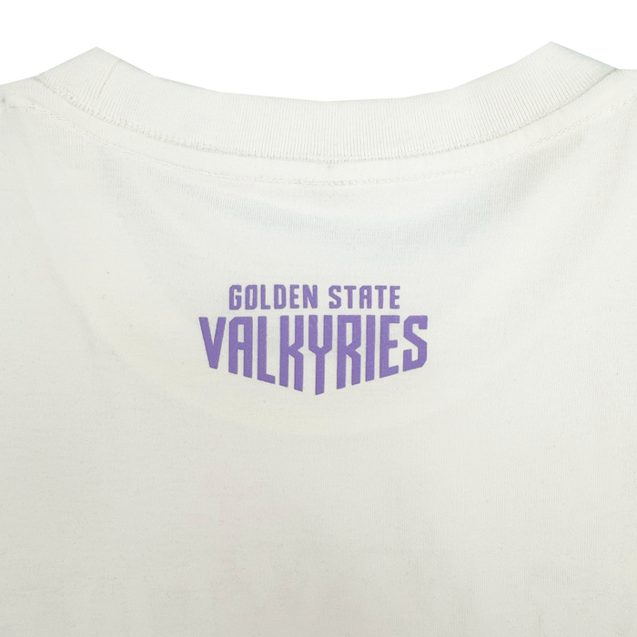 A close-up of the GSV Golden State Valkyries Rec League Tee shows “GOLDEN STATE” in small purple text above “VALKYRIES,” which appears bold and stylized, on the back neckline. Made from organic cotton heavy fabric.
