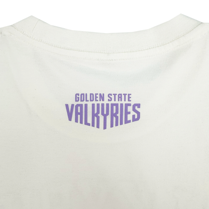 A close-up of the GSV Golden State Valkyries Rec League Tee shows “GOLDEN STATE” in small purple text above “VALKYRIES,” which appears bold and stylized, on the back neckline. Made from organic cotton heavy fabric.