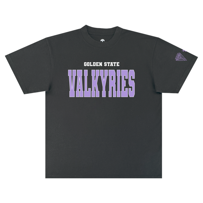 The GSV Varsity Tee by GSV is a classic fit, 100% cotton black t-shirt featuring “GOLDEN STATE” in white above bold purple “VALKYRIES” block letters across the chest. A small purple triangle logo appears on the left sleeve, standing out against the plain white background.