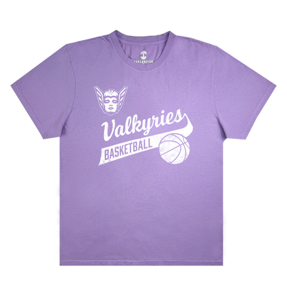 The GSV Vintage Tee by GSV is a classic fit, 100% cotton t-shirt in lavender, featuring a stylized Valkyrie face, the word “Valkyries” in script, “BASKETBALL” in block letters beneath, and a white basketball graphic—all inspired by the Golden State Valkyries.