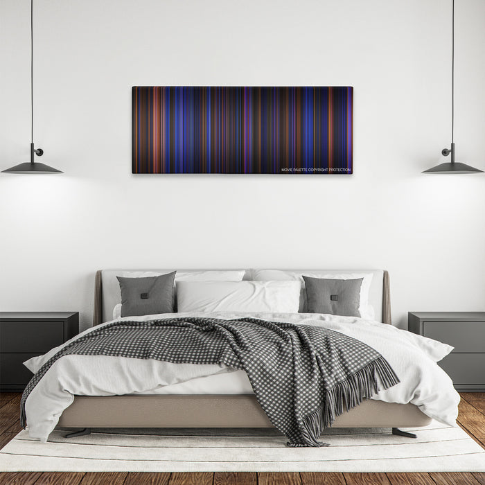 Hamilton color palette canvas above a bed, between two black pendant lamps