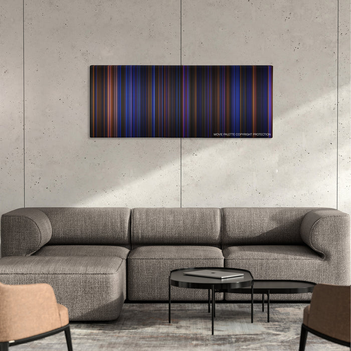 Hamilton color palette canvas on a concrete wall above a gray sectional sofa