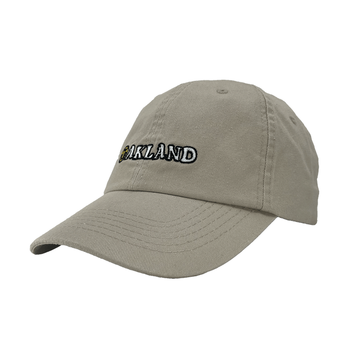 Angled side view of khaki Oakland Dad Hat, with embroidered design by Dustin O. Canalin (DOC).