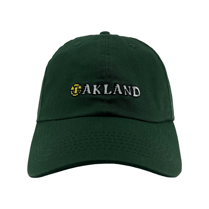 Front view of green Oakland Dad Hat, with embroidered wordmark design by Dustin O. Canalin (DOC).