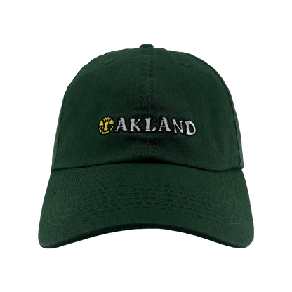 Front view of green Oakland Dad Hat, with embroidered wordmark design by Dustin O. Canalin (DOC).