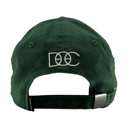 The Happy Oakland Dad Hat from Oaklandish is shown from the back. It features white embroidered text that reads "D O C" with a stylized basketball integrated into the "O." Embracing Bay Area culture, this green cap has an adjustable strap with a metallic buckle for size fitting.