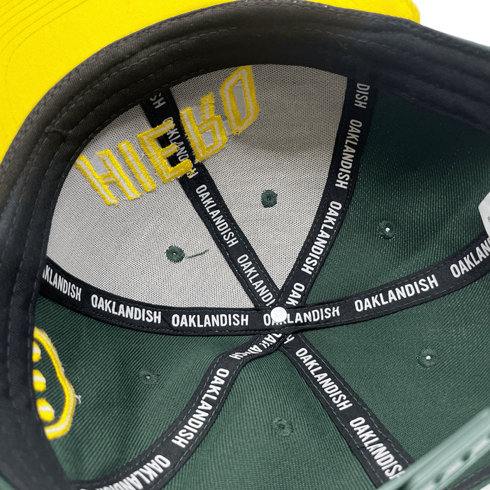 Inside view of the crown of a cap with OAKLANDISH taping inside the crown.