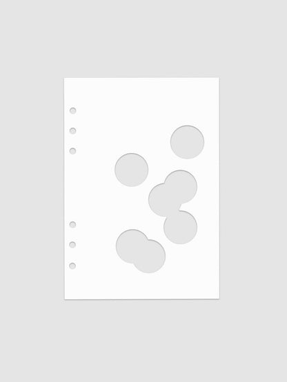 White dashboard from the Ink Blot Planner Dashboard Duo on a neutral background in size A5, pre-punched for 6-ring planners.
