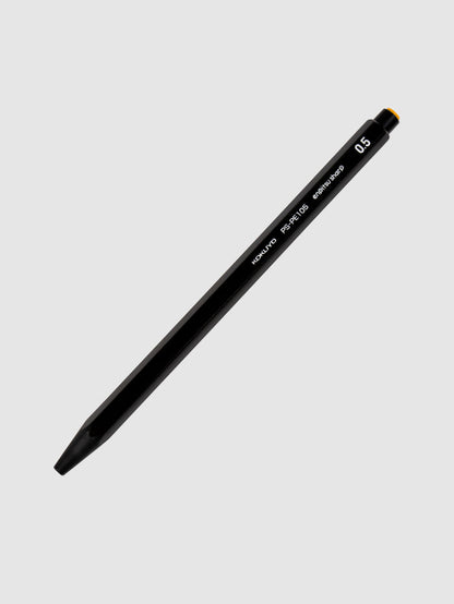 Kokuyo Enpitsu Sharp Mechanical Pencil, 0.5, Black, Cloth and Paper. Pencil turned to the right against a neutral background.