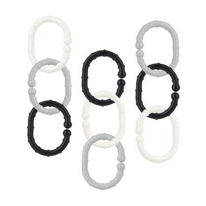 Eighteen Linkables Teething Toys in black, grey, and white—each with oval textured links and rounded bumps—are vertically arranged against a white background.