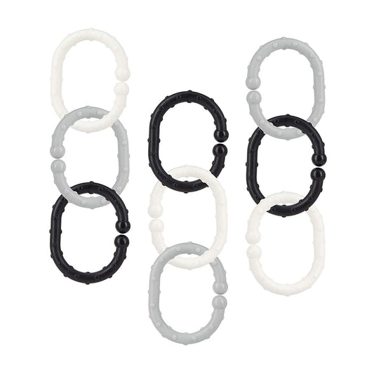 Eighteen Linkables Teething Toys in black, grey, and white—each with oval textured links and rounded bumps—are vertically arranged against a white background.