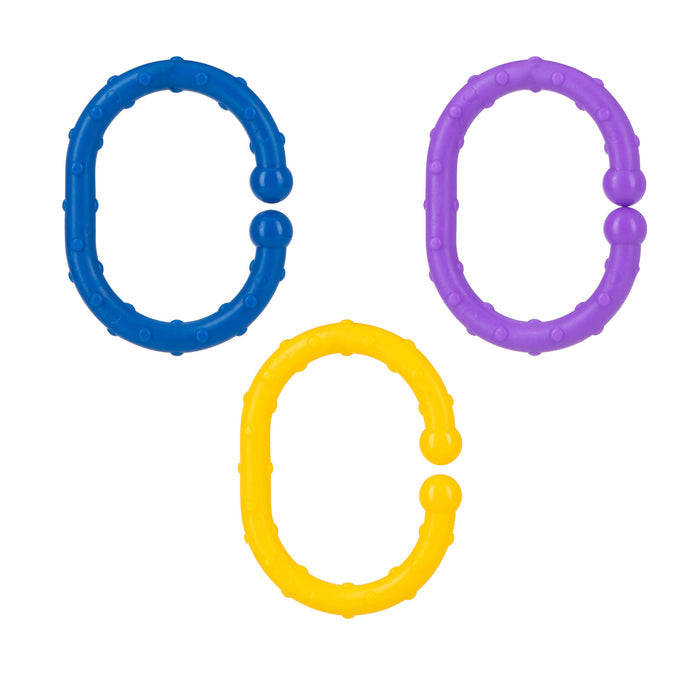 Three Nuby Linkables Teething Toys in primary colors are shown on a white background. With textured surfaces and small openings, these toy links are perfect for sensory play. Available in an 18 pack.