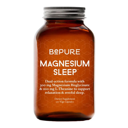 An amber glass bottle of BePure Magnesium Sleep dietary supplement with a silver metal screw cap.