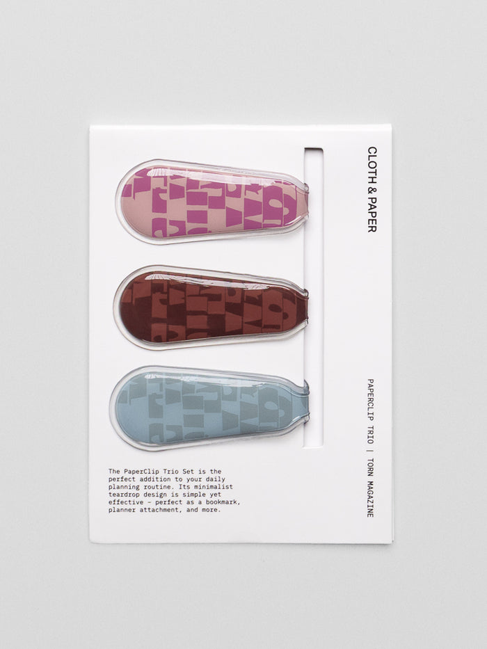 Magnetic Bookmarks | Trio in pattern torn magazine including pink, red, and blue bookmarks shown on backing card.