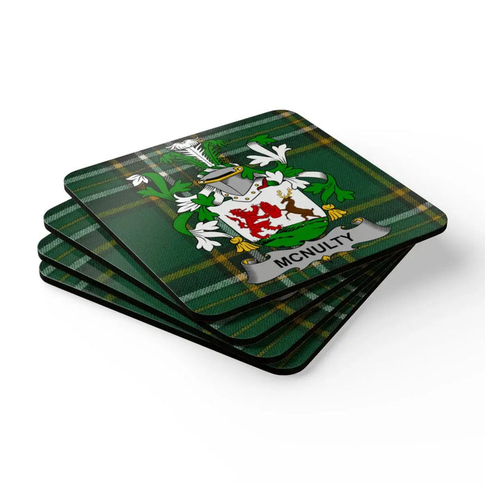 McNulty Family Crest on Green Tartan Coasters